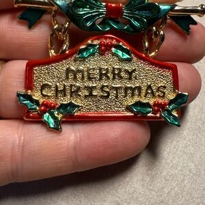 Get in the spirit with this Festive AJC Christmas Brooch with Holly Accents